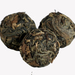 Nannuo Mountain Arbor Tree Pu-erh Black Tea Dragon Pearls