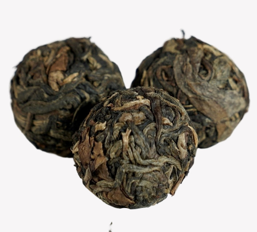 Nannuo Mountain Arbor Tree Pu-erh Black Tea Dragon Pearls