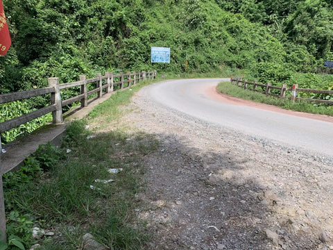 Tong Qing He winding road Yiwu Mountains