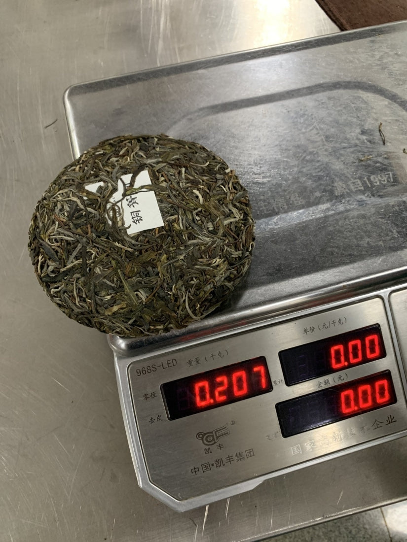 Prestigious Yiwu Tong Qing He Ancient Tree Gushu Raw Pu-erh Tea