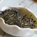 Prestigious Yiwu Tong Qing He Ancient Tree Gushu Raw Pu-erh Tea