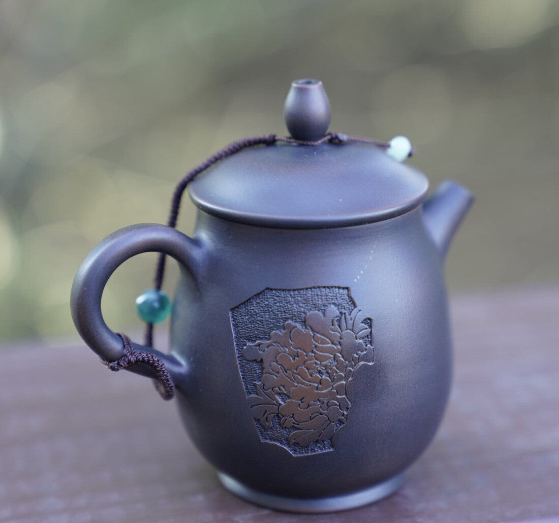 Artisan Jian Shui Purple Clay Carved Orchid Teapot