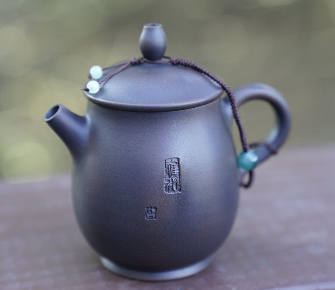 Artisan Jian Shui Purple Clay Carved Orchid Teapot