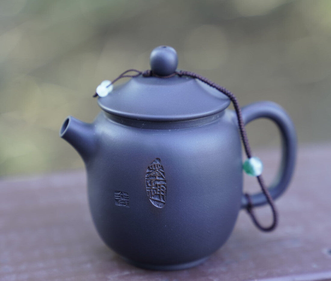 Artisan Jian Shui Purple Clay Carved Orchid Teapot