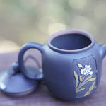 Artisan Jian Shui Purple Clay Carved Orchid Teapot