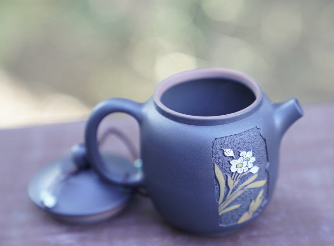 Artisan Jian Shui Purple Clay Carved Orchid Teapot