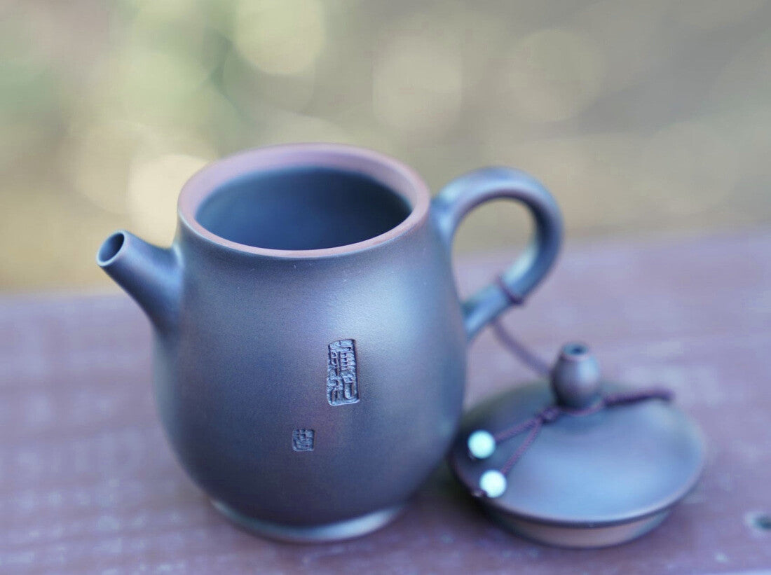 Artisan Jian Shui Purple Clay Carved Orchid Teapot