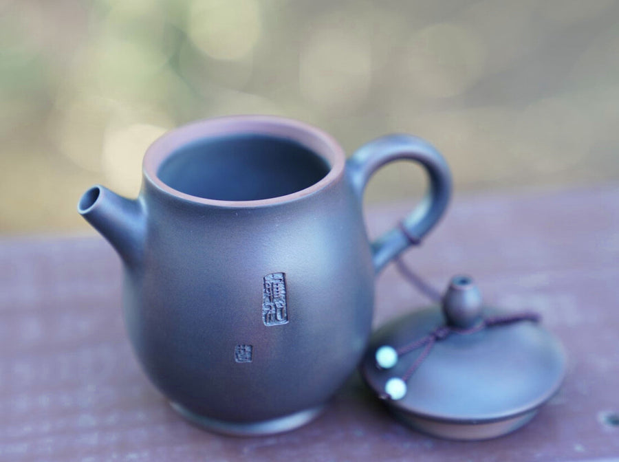 Artisan Jian Shui Purple Clay Carved Orchid Teapot