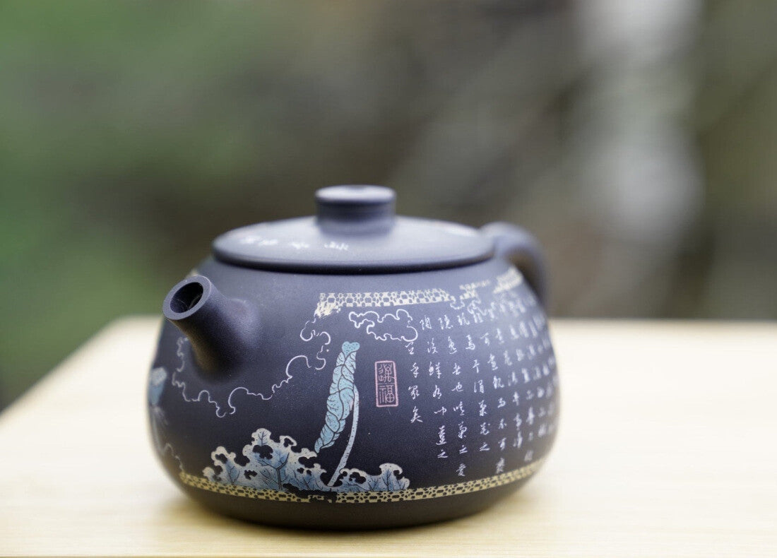 Artisan Jian Shui Purple Clay Flower Inscribed Tea Set