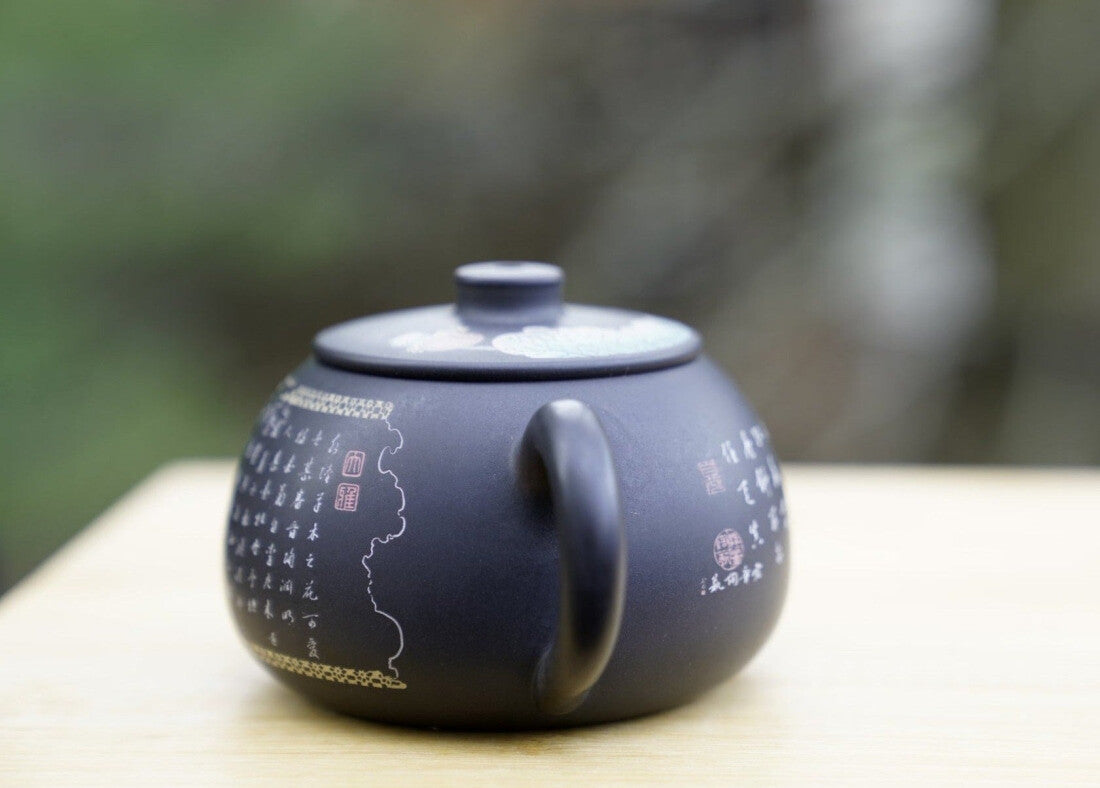 Artisan Jian Shui Purple Clay Flower Inscribed Tea Set