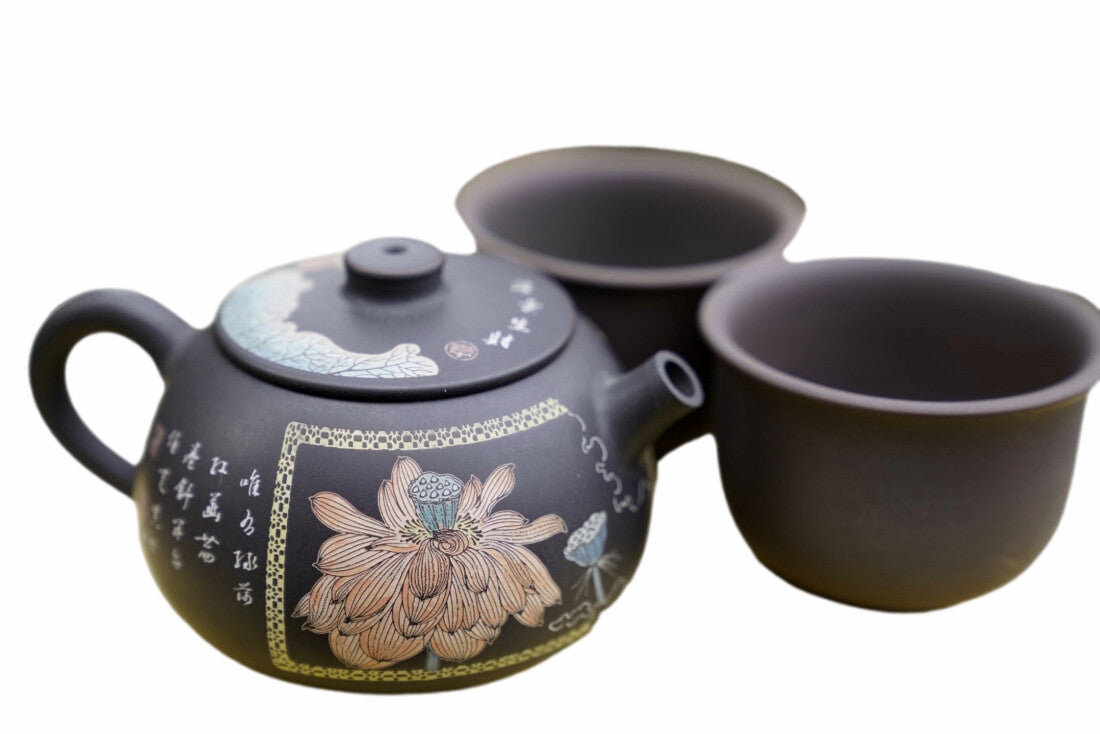 Artisan Jian Shui Purple Clay Flower Inscribed Tea Set