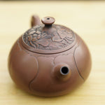 Artisan Jian Shui Purple Clay Lotus Flower Relief Teapot