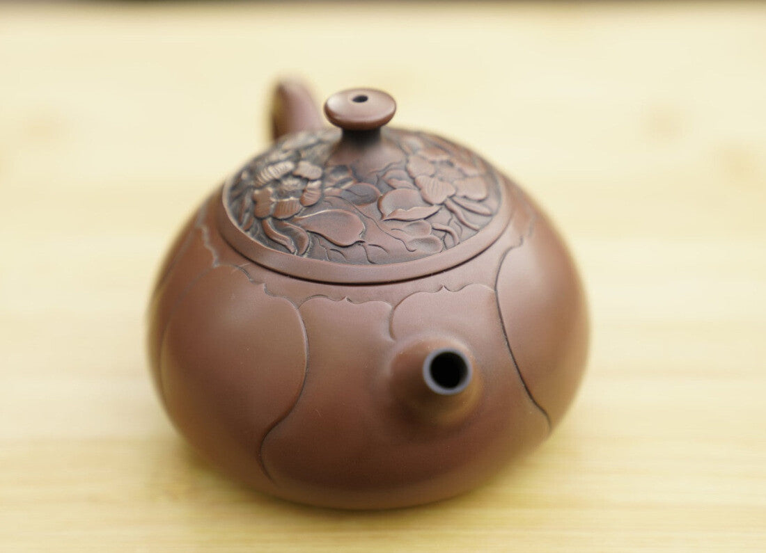 Artisan Jian Shui Purple Clay Lotus Flower Relief Teapot