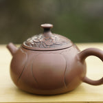 Artisan Jian Shui Purple Clay Lotus Flower Relief Teapot