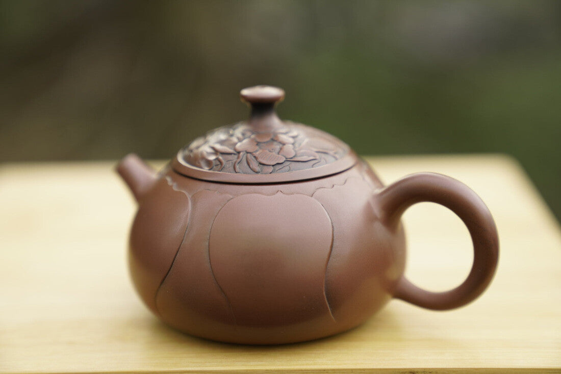 Artisan Jian Shui Purple Clay Lotus Flower Relief Teapot