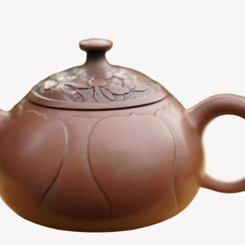 Artisan Jian Shui Purple Clay Lotus Flower Relief Teapot