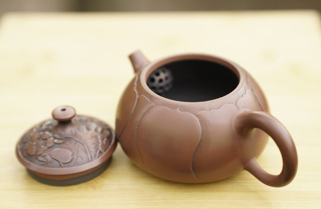 Artisan Jian Shui Purple Clay Lotus Flower Relief Teapot