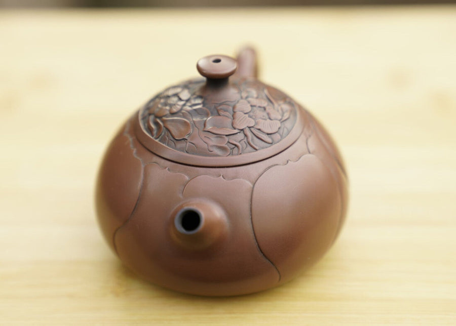 Artisan Jian Shui Purple Clay Lotus Flower Relief Teapot