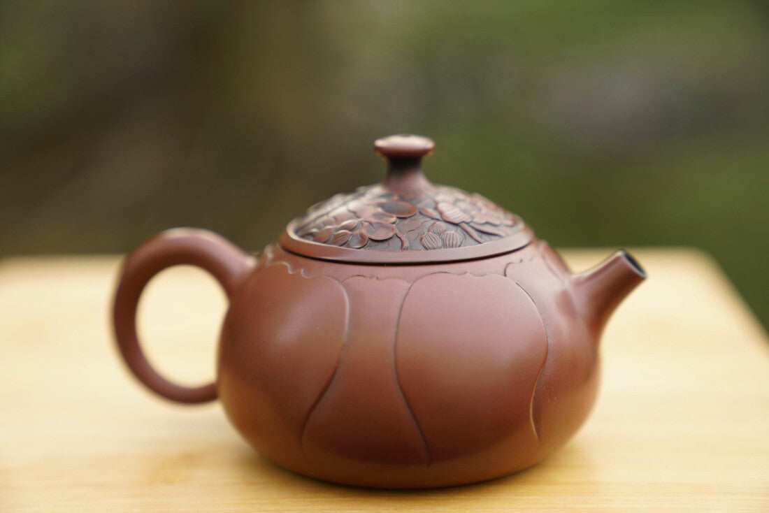 Artisan Jian Shui Purple Clay Lotus Flower Relief Teapot