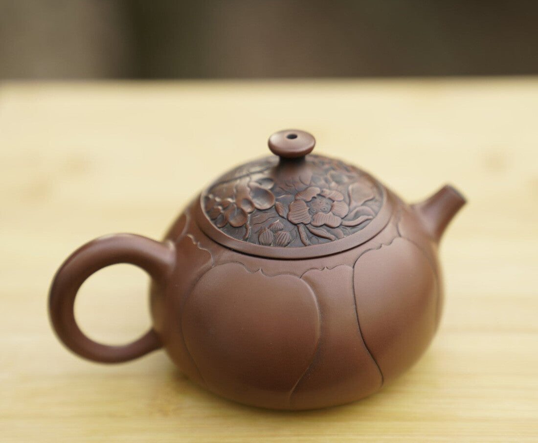 Artisan Jian Shui Purple Clay Lotus Flower Relief Teapot