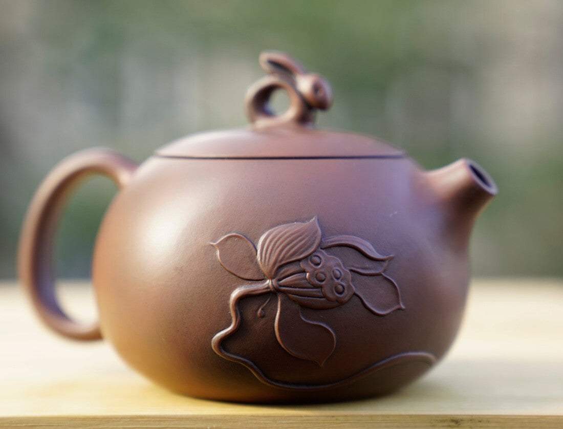 Artisan Jian Shui Purple Clay Lotus Relief Rabbit Handle Teapot