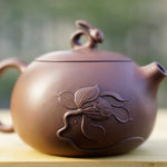 Artisan Jian Shui Purple Clay Lotus Relief Rabbit Handle Teapot