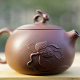 Artisan Jian Shui Purple Clay Lotus Relief Rabbit Handle Teapot