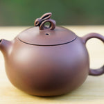 Artisan Jian Shui Purple Clay Lotus Relief Rabbit Handle Teapot