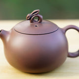 Artisan Jian Shui Purple Clay Lotus Relief Rabbit Handle Teapot