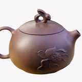 Artisan Jian Shui Purple Clay Lotus Relief Rabbit Handle Teapot