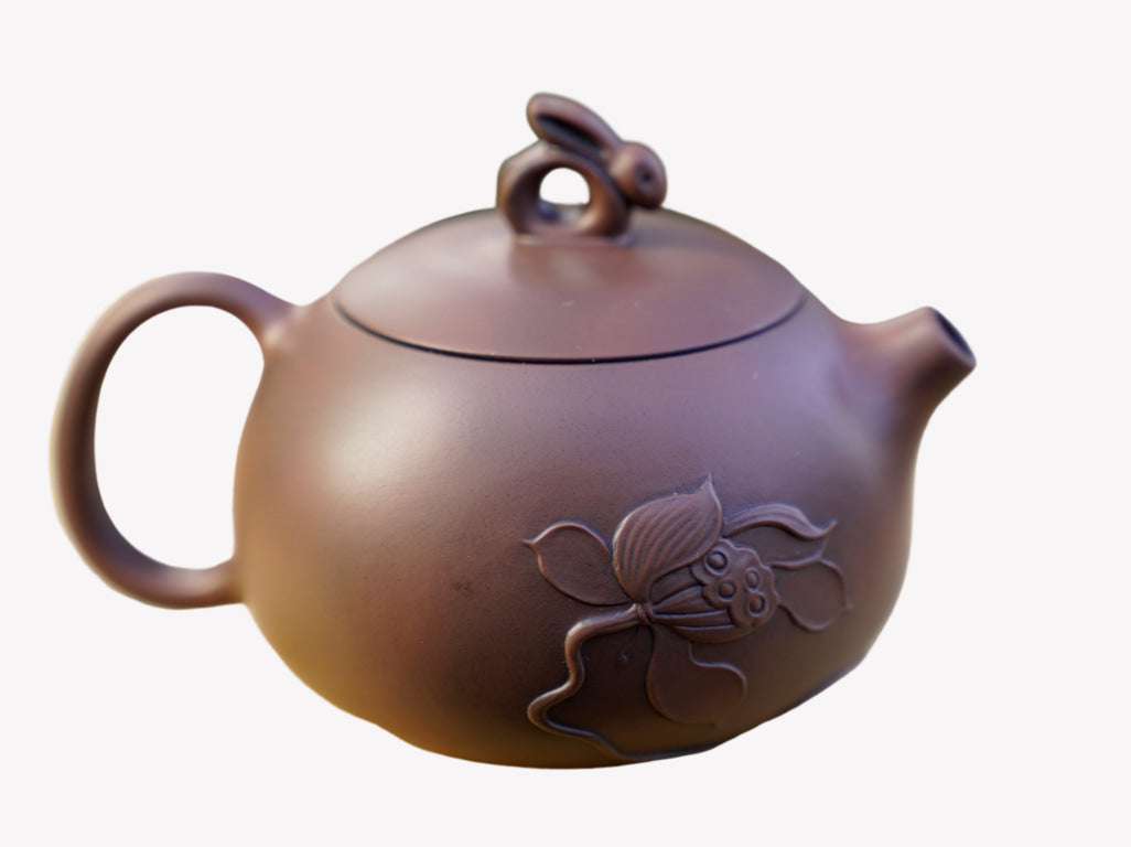 Artisan Jian Shui Purple Clay Lotus Relief Rabbit Handle Teapot
