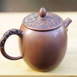Artisan Jian Shui Purple Clay Lotus Relief Tall Teapot