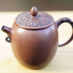 Artisan Jian Shui Purple Clay Lotus Relief Tall Teapot