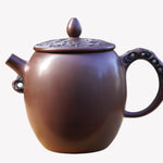 Artisan Jian Shui Purple Clay Lotus Relief Tall Teapot