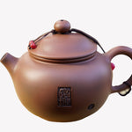 Artisan Jian Shui Purple Clay Rubbings Relief with Thread Teapot