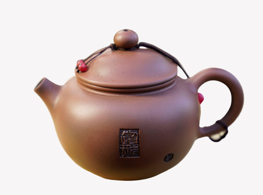 Artisan Jian Shui Purple Clay Rubbings Relief with Thread Teapot
