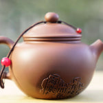 Artisan Jian Shui Purple Clay Rubbings Relief with Thread Teapot