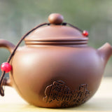 Artisan Jian Shui Purple Clay Rubbings Relief with Thread Teapot