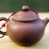 Artisan Jian Shui Purple Clay Rubbings Relief with Thread Teapot