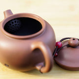 Artisan Jian Shui Purple Clay Rubbings Relief with Thread Teapot