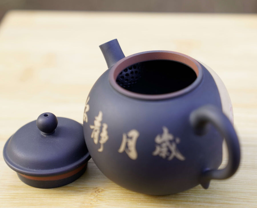 Artisan Jian Shui Purple Clay Teapot Inscribed Bird