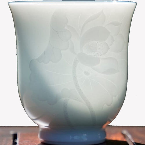 Jingdezhen White Porcelain Teacup Bell Shape Lotus Relief