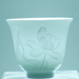 Jingdezhen White Porcelain Teacup Bell Shape Lotus Relief